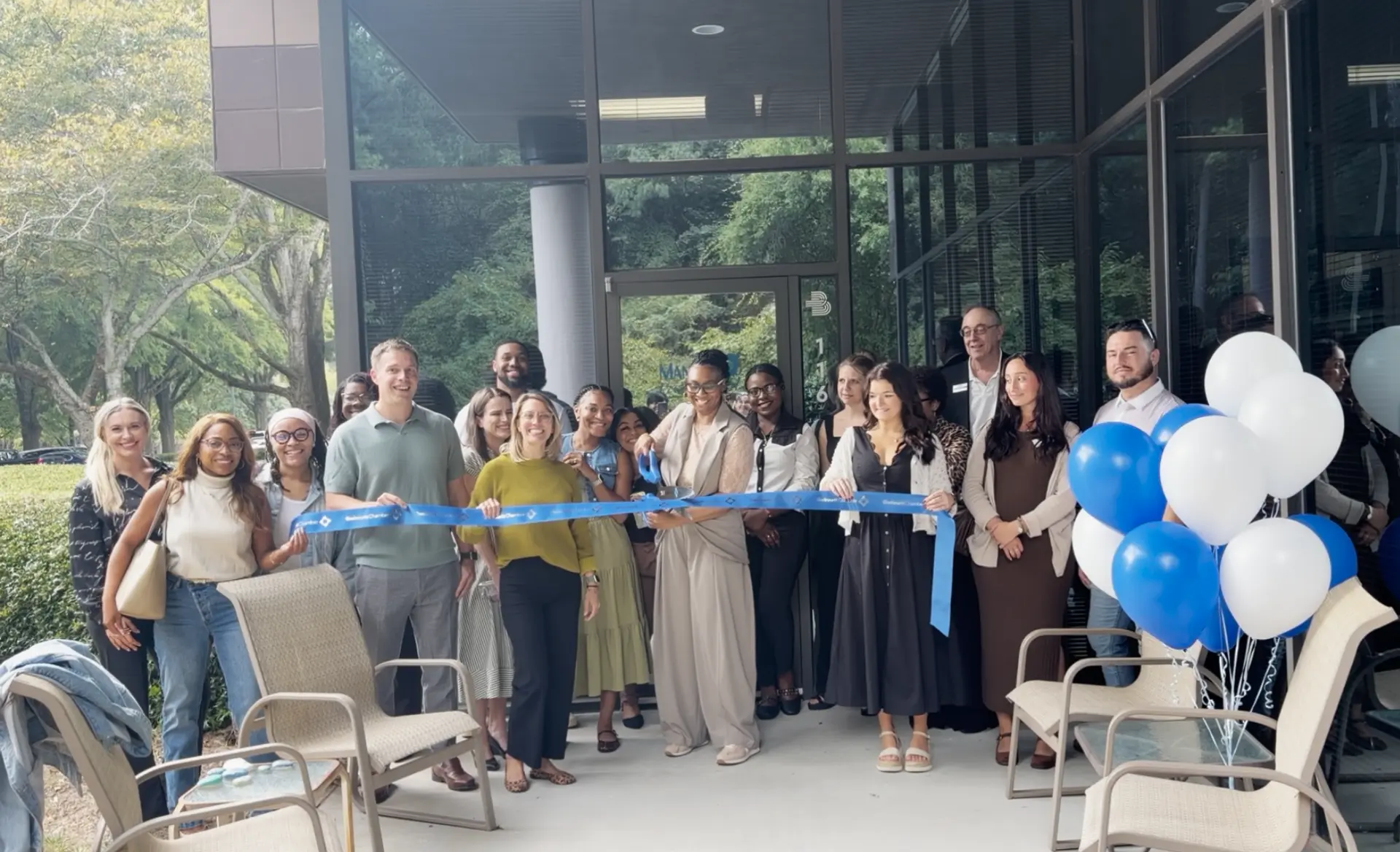 Team members cutting the ribbon at Manna Treatment's 2026 ribbon cutting ceremony
